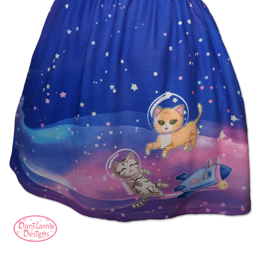 Cats in space dress print close up
